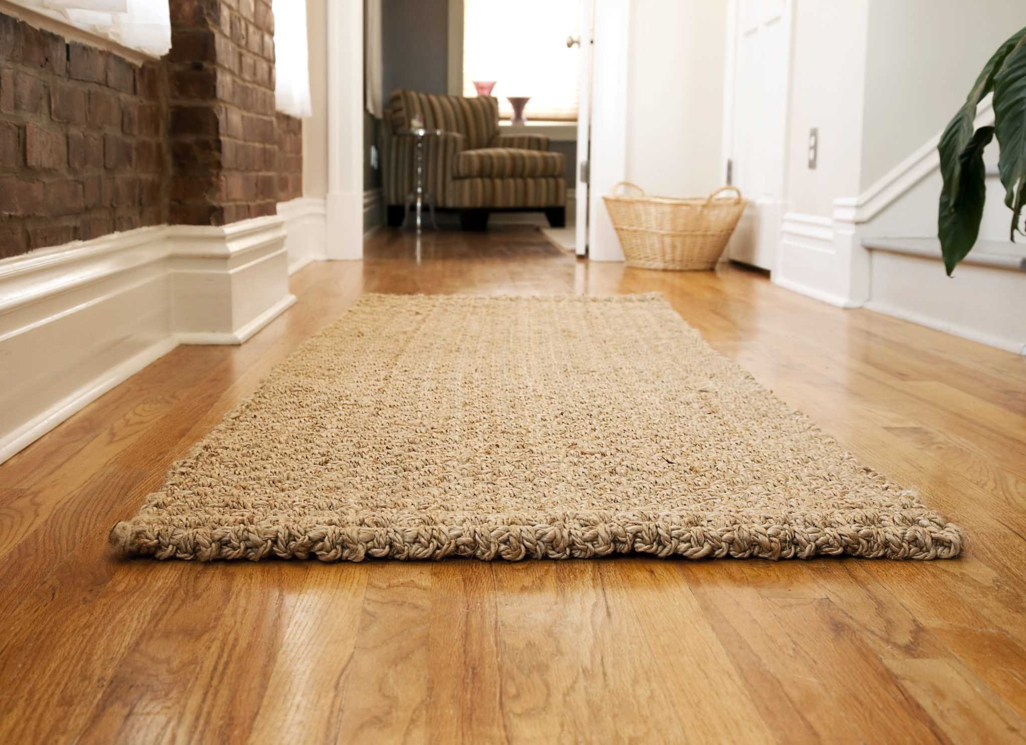 dark rugs in kitchen on light floor