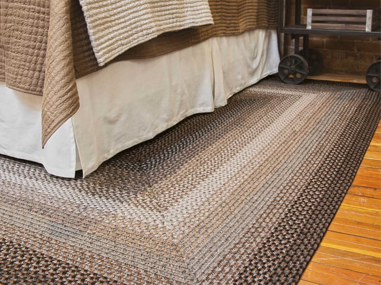 Braided rug in the bedroom.